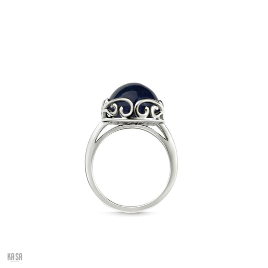 Tanzanite cabochon and sterling silver filigree ring