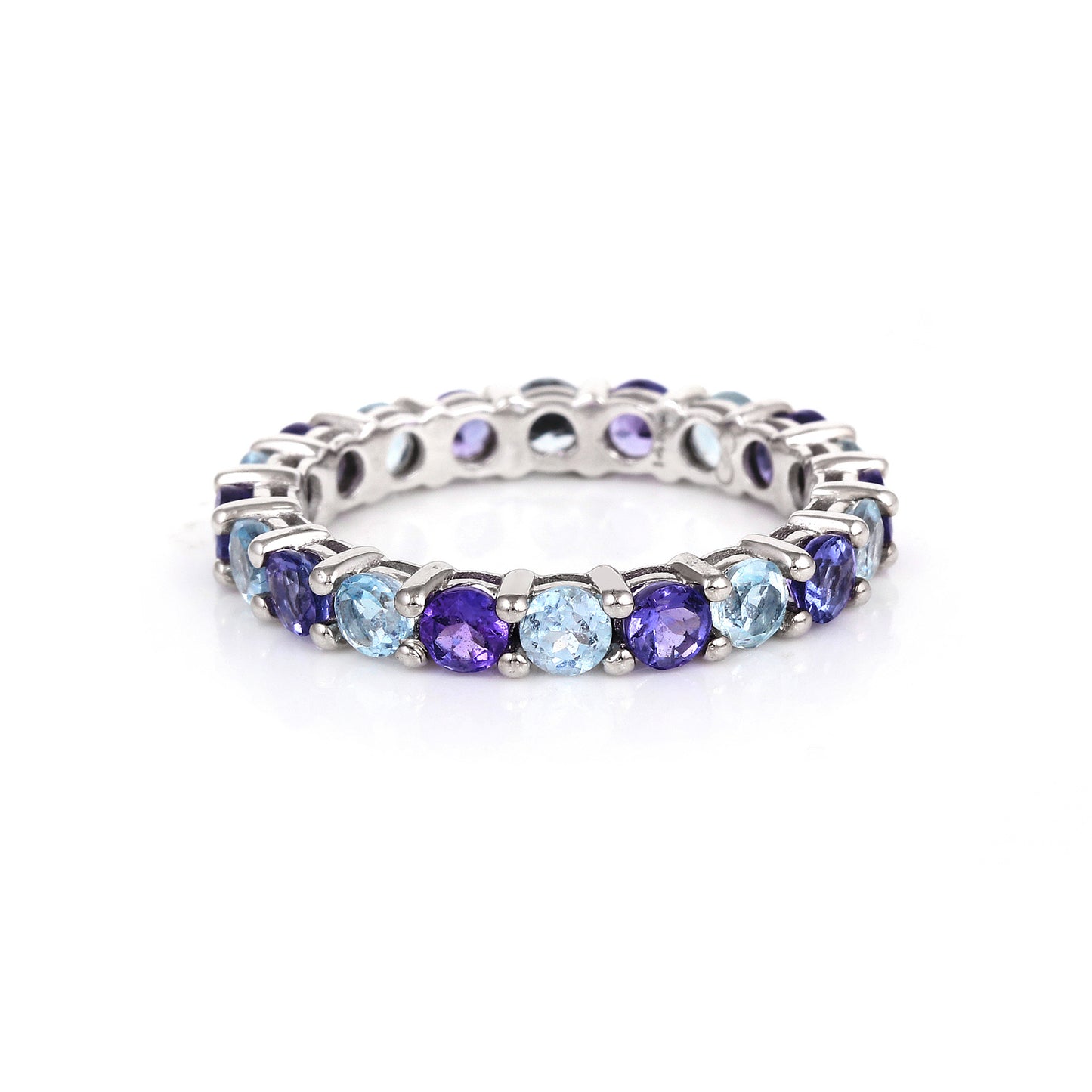 Tanzanite and sky blue topaz eternity ring in 14K white gold