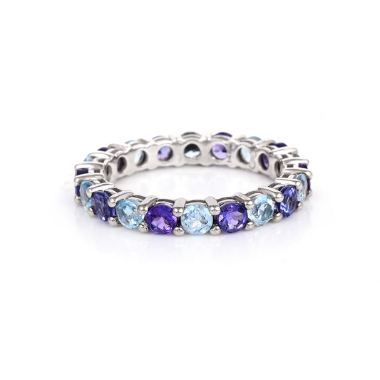 Tanzanite and sky blue topaz eternity ring in 14K white gold